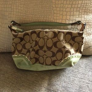 Tan Coach purse.